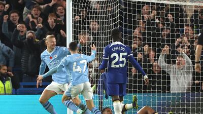 Manchester City's Erling Haaland celebrates after scoring his side's third goal. AP