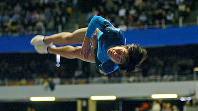 Oksana Chusovitina of Uzbekistan performs on the vault during the 13the French international gymnastics tournament, March 14, 2004 in the Gerland arena in Lyon. Chusovitina won the vault event.
