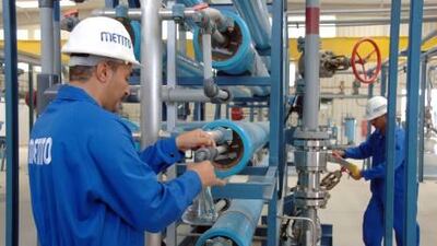 Workers at Metito's desalination plant in Dubai. The firm is looking into solar desalination.