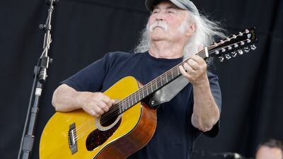 Crosby evolved from a baby-faced harmony singer with the Byrds to a mustachioed hippie superstar. AP Photo