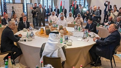 Mr Lapid, far left, delivers opening remarks during a roundtable with, from left, Mr Blinken; Sheikh Abdullah bin Zayed, Minister of Foreign Affairs and International Co-operation; and Nasser Bourita, Sameh Shoukry and Abdullatif Al Zayani, the foreign ministers of Morocco, Egypt and Bahrain, respectively. AFP