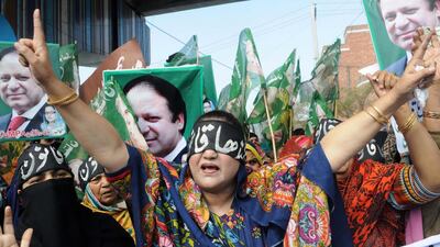 Supporters of former Prime Minister Nawaz Sharif wear headbands reading in Urdu 'Blind Justice' during a protest after the Supreme Court barred him from leading the ruling Pakistan Muslim League Nawaz, in Multan, Pakistan, February 24, 2018. Faisal Kareem /EPA Photo