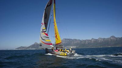 Abu Dhabi Ocean Racing's Azzam sails toward the first leg finish in South Africa on Wednesday, where they won the opening leg of the 20145/15 Volvo Ocean Race. Rodger Bosch / AFP