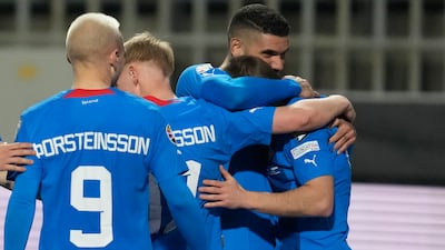 Albert Gudmundsson celebrates with his teammates after scoring Iceland's fourth goal. AP