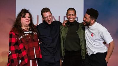 From left to right, artists Tai Shani, Lawrence Abu Hamdan, Helen Cammock, and Oscar Murillo pose for a photograph after being announced as the joint winners of Turner Prize 2019. EPA