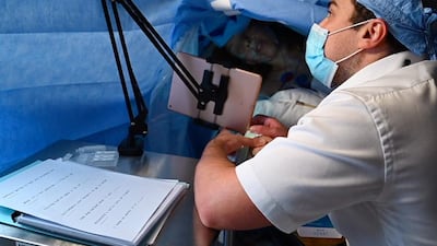 Medics could converse with Emirati patient Salha Al Dhaheri as she underwent rare 'awake' neurosurgery at Cleveland Clinic Abu Dhabi. Courtesy: CCAD