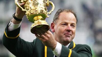 South Africa coach Jake White lifts the Webb Ellis trophy after winning the 2007 Rugby World Cup final over England. Paul Harding / Action Images / October 20, 2007