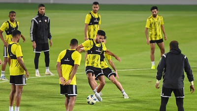 The UAE football team train at the Abdullah bin Khalifa Stadium in Doha ahead of their 2022 World Cup play-off against Australia on Tuesday. Photo: UAE FA