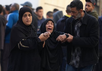 Mourners attend the funeral of Palestinians killed in an Israeli strike. Reuters