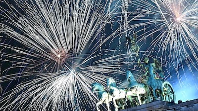 Fireworks illuminate the Quadriga on the Brandenburg Gate during the New Year celebrations in Berlin, Germany. AFP