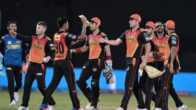 Sunrisers Hyderabad players celebrate the wicket of Rising Pune Supergiants batsman George Bailey. Noah Seelam / AFP