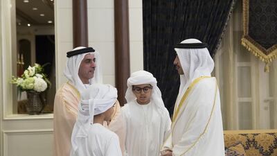Sheikh Saif bin Zayed, Deputy Prime Minister and Minister of Interior, left, Sheikh Zayed bin Abdullah bin Zayed Al Nahyan, second left, Sheikh Mohamed bin Abdullah bin Zayed, third left, and Sheikh Abdullah bin Zayed, Minister of Foreign Affairs and International Cooperation, right, at Mushrif Palace. Mohamed Al Hammadi / Crown Prince Court - Abu Dhabi