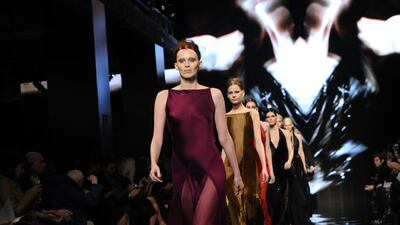 Model Karen Elson leads the finale for Donna Karan New York. AP
