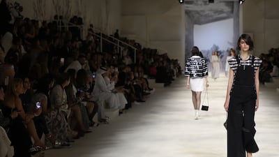 Models on the runway at the Chanel cruise 2021-22 show in Dubai