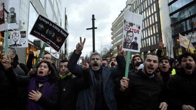 Protesters demonstrate against a visit of Turkey's President Erdogan in Brussels. Reuters