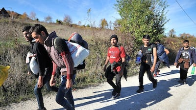 Migrants near the border of Bosnia and Croatia, where authorities have allegedly ordered people to be pushed out of the EU. AFP