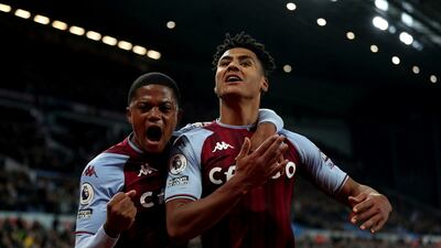 Aston Villa's Ollie Watkins celebrates scoring the opening goal with Leon Bailey. AP
