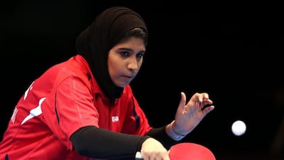 Noura Al Maazmi of the UAE in action against Yu Mengyu of Singapore during Day 1 of the 2016 Table Tennis Asian Cup at Dubai World Trade Centre on April 28, 2016 in Dubai. (Photo by Warren Little/Getty Images)