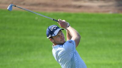 Danny Willett of England plays his second shot on the third hole on his way to a second-round 67. Getty