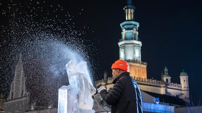 A sculptor in action at the Poznan Ice Festival in Poland. EPA