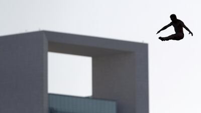 Abu Dhabi, United Arab Emirates - November 10, 2018: Alain Kohl of Luxembourg competes in the final of the mens section at the Fina High Board Diving World Cup. Saturday, Novemeber 10th, 2018 at the Abu Dhabi Yacht and Sailing Club, Abu Dhabi. Chris Whiteoak / The National