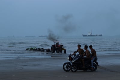 Vessels in the Strait of Hormuz near the beach of Bandar Abbas, Iran. Reuters