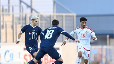 Abdullah Ramadan runs with the ball during the UAE's friendly against Paraguay. Photo: UAE FA