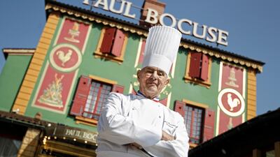 French Chef Paul Bocuse poses outside his famed Michelin restaurant L'Auberge du Pont de Collonges in 2011. Laurent Cipriani / AP Photo