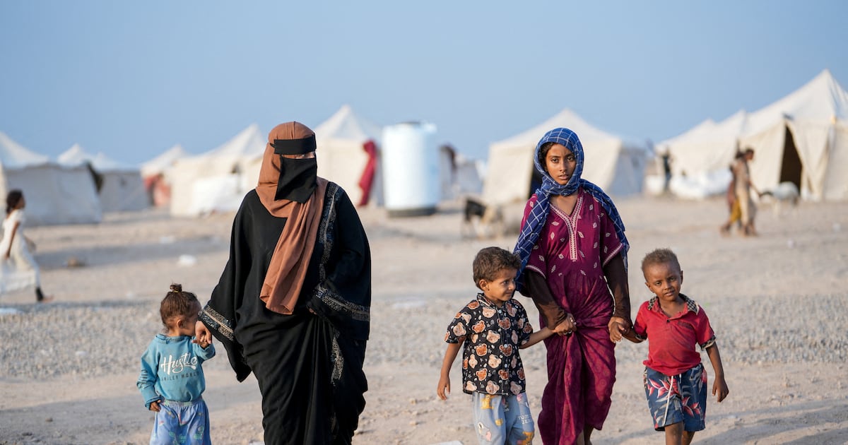 Photo: thenationalnews.com Women and children at a camp for internally displaced people near Aden, Yemen. Reuters