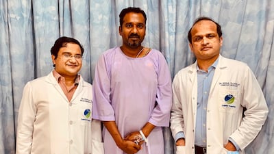 Manokurian Mathew, 40, with doctors who discovered his headaches and difficulty sleeping were symptoms of two separate brain infarctions. Courtesy: Zulekha Hospital Dubai