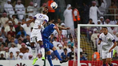 Al Ain defender Mohamed Ahmed, left, vies for a header against Al Hilal midfielder Thiago Neves during their Asian Champions League semi-final second-leg match on Tuesday night. Marwan Naamani / AFP