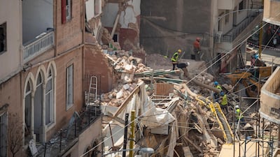 Rescuers search for survivors under a collapsed building in Beirut for a third day on September 5, 2020. AP Photo