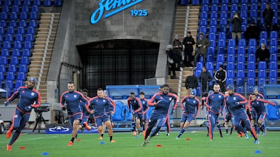 Lyon's players take part in a training session at the Petrovsky stadium in St. Petersburg on October 19, 2015 on the eve of the UEFA Champions League group H football match between FC Zenit and Olympique Lyonnais. AFP PHOTO / OLGA MALTSEVA