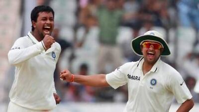 Suresh Raina, right, last played in a Test series against New Zealand last year. Mahesh Kumar A / AP Photo