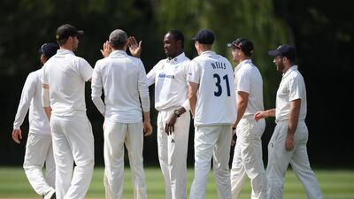 Sussex players congratulate Archer. Getty
