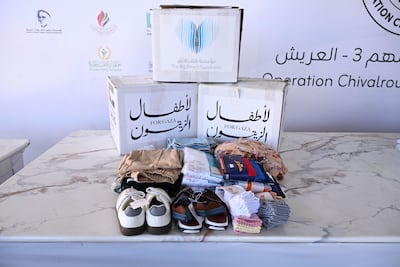 The relief package includes new clothing for children affected by the conflict. Photo: Wam