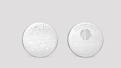 The coin features a verse from the work of Sultan Bin Ali Al Owais. Photo: UAE Central Bank