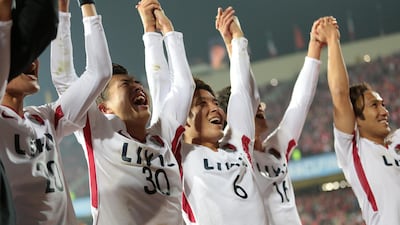 Kashima Antlers players celebrate after winning the Asian Champions League. Getty Images