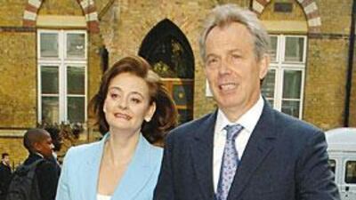 Former prime minister Tony Blair with his wife Cherie, who is to be investigated over a ruling she made as a judge.