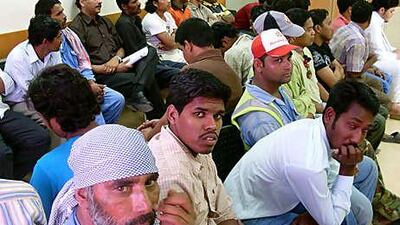 Patients await medical attention in the male waiting area of the accident and emergency unit of Hamad Medical Centre in Doha.