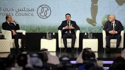 Umberto Gandini, right, and Fifa president candidate Gianni Infantino, left, listens to FC Barcelona’s president Josep Maria Bartomeu, centre. Ali Haider / EPA