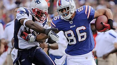 David Nelson of the Buffalo Bills, right, fends off the Patriots Leigh Bodden during the Bills comeback win against their old rivals in the AFC.