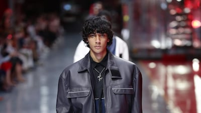 A model walks the runway at the fashion debut of the first co-ed Ferrari collection at Ferrari Factory on June 13, 2021 in Maranello, Italy. Getty Images