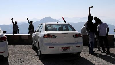 People gather at Jebel Jais on National Day in Ras Al Khaimah. Pawan Singh / The National