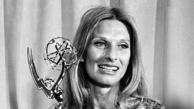 Cloris Leachman poses with her Emmy award for Outstanding Single Performance by an Actress in 'A Brand New Life' at the primetime television Emmy Awards on May 21, 1975. AP