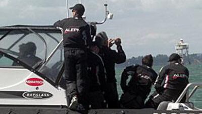 A crew waits in the transfer boats.