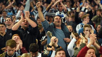 A young Newcastle United fan celebrates after victory in the English League Cup fourth round match against Manchester City at Etihad Stadium on October 29, 2014, in Manchester, England. Michael Regan / Getty Images