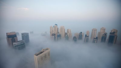 Morning fog descends over Dubai Marina in 2013. Sarah Dea / The National