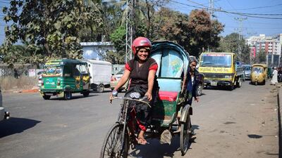 Bangladesh's lone female rickshaw-puller Mosammat Jasmine on her battery-run rickshaw in Chittagong city on January 15, 2017. AFP