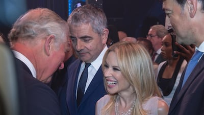 Prince Charles meets Rowan Atkinson and Kylie Minogue after attending a one off performance of We Are Most Amused and Amazed at London Palladium. WPA Pool / Getty Images